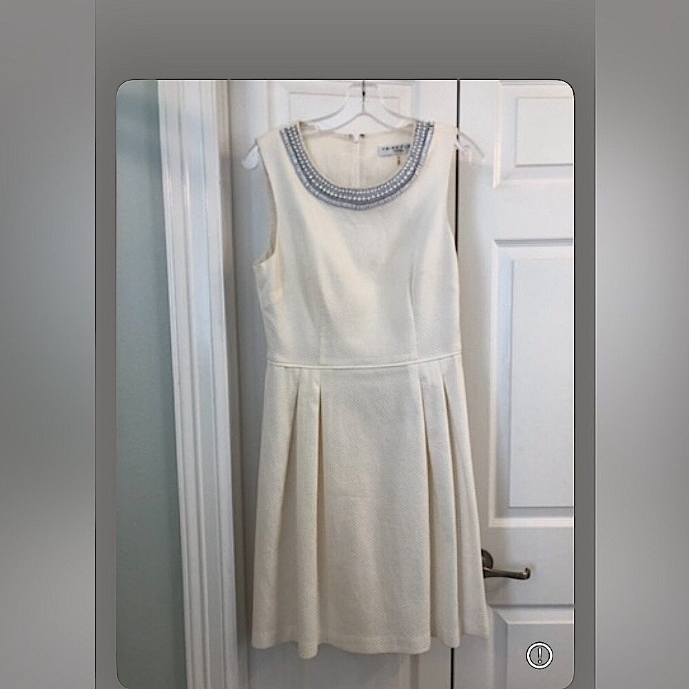 Pristine Trina Turk dress. Jeweled embroidered neckline.